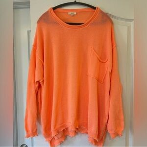 Bright Orange Knit Sweater with Distressed Hem